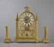 A very rare and decorative French filigrain ormolu mantel clock garniture